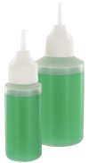 Dispensing bottles with nozzles