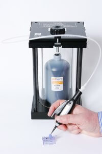 cyanoacrylate adhesive dispensed using a pressure pot