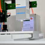Automated dispensing and UV light curing system