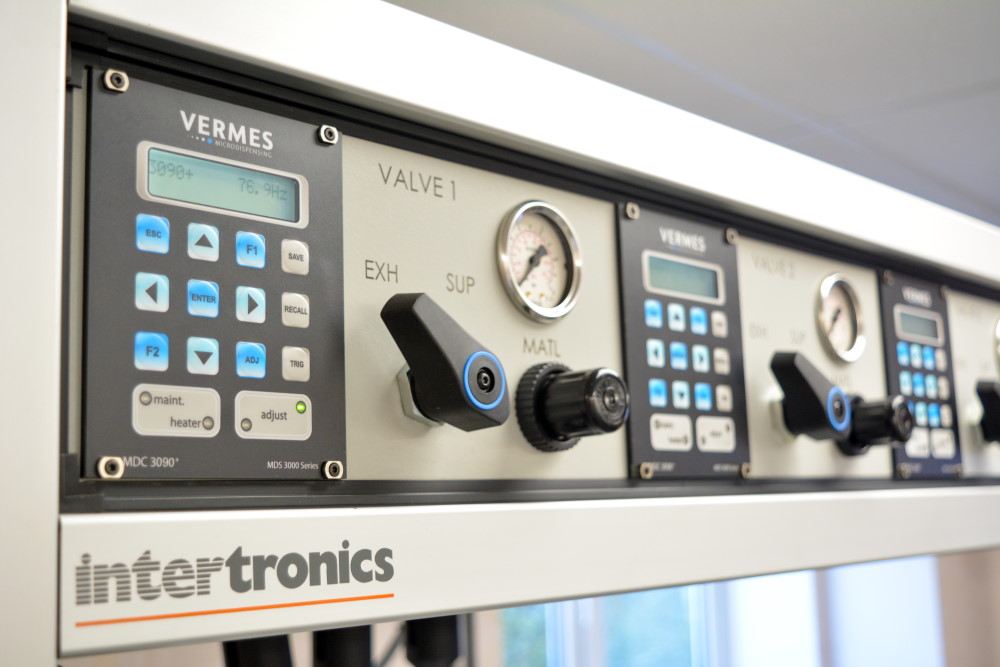 Robotic Dispensing System with Three Jetting Valves - Intertronics