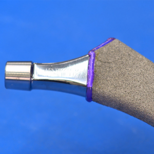 Dymax Speedmask applied to orthopaedic implant