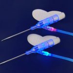 Fluorescing Catheters showing application of Dymax adhesive